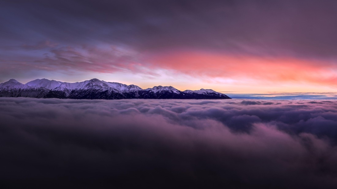 snowy-mountain-range-above-the-clouds-4k-3840×2160