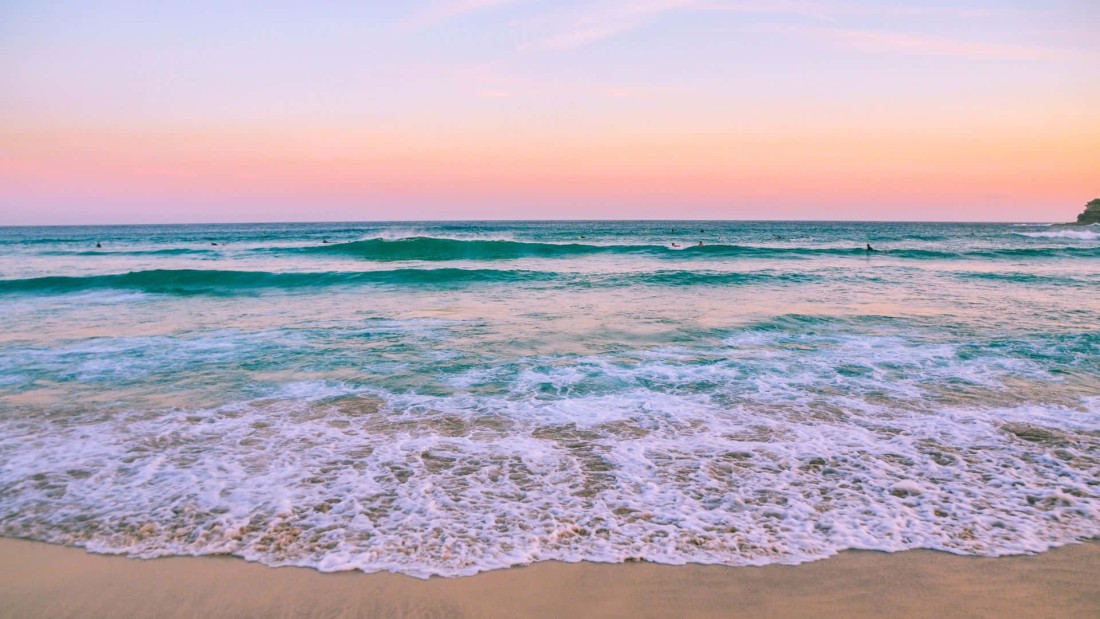 beach-ocean-wallpaper-pastel-sky-teal-waves-1920×1080