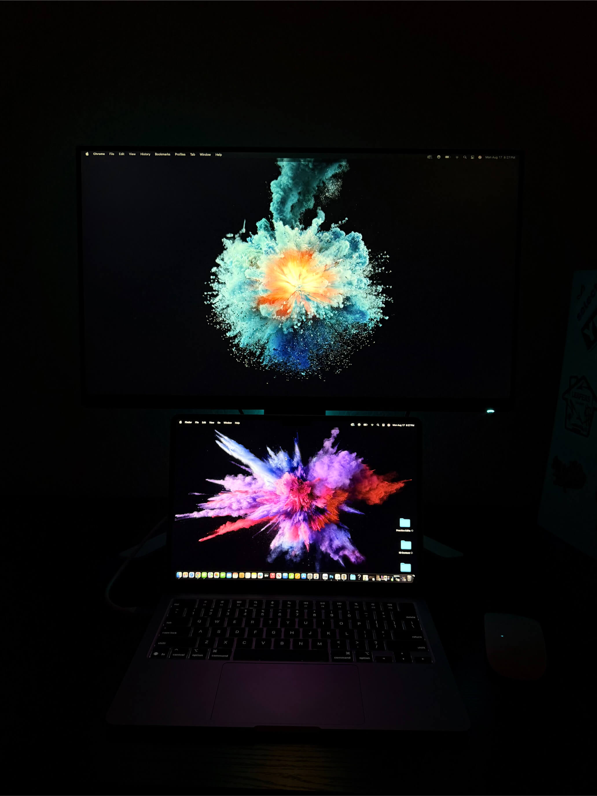 Monitor and laptop setup using Blue Explosion AMOLED and Color AMOLED Smoke wallpapers