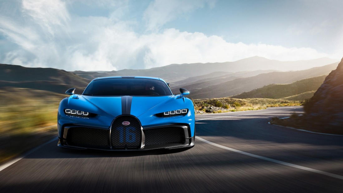 blue-bugatti-chiron-mountain-road-wallpaper-2560×1440