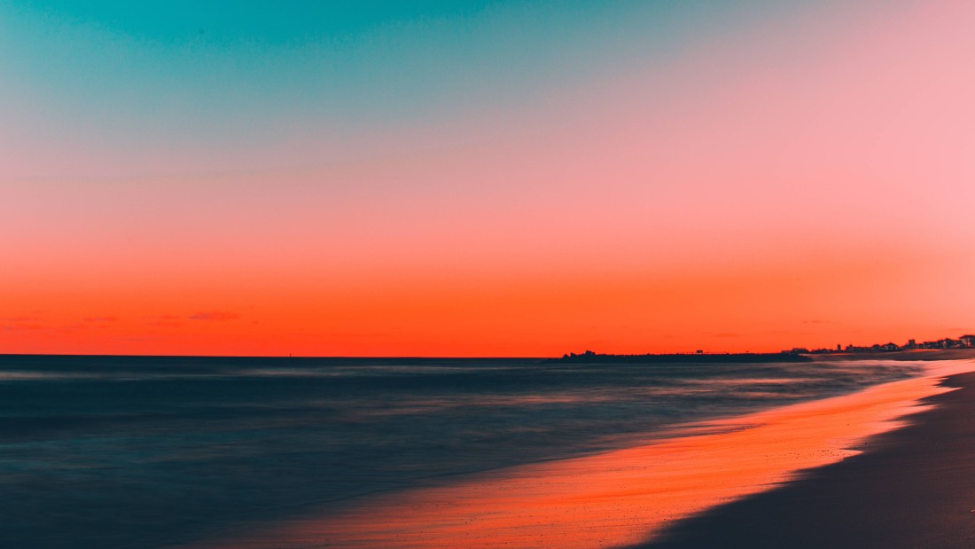 orange-sunset-beach-shoreline-5k-wallpaper-5120×2880